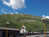 China  Tagong. Grasslands. Tagong Temple in town. Prayer flags dominate the mountainside sending prayers to the heavens. : Asia, China, Mountains, Tagong Grassland, Tagong Temple, Temple