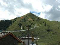 China  Tagong. Grasslands. Prayer flags dominate the mountainside sending prayers to the heavens. : Asia, China, Mountains, Tagong Grassland