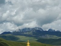 China  Tagong. Grasslands. Second monastery on the Grasslands under contruction. Snowcapped mountain in the distance. : Asia, China, Tagong Grassland, Temple