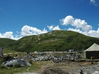 China  Tagong. Grasslands. Prayer flags dominate the mountainside sending prayers to the heavens. : Asia, China, Mountains, Tagong Grassland